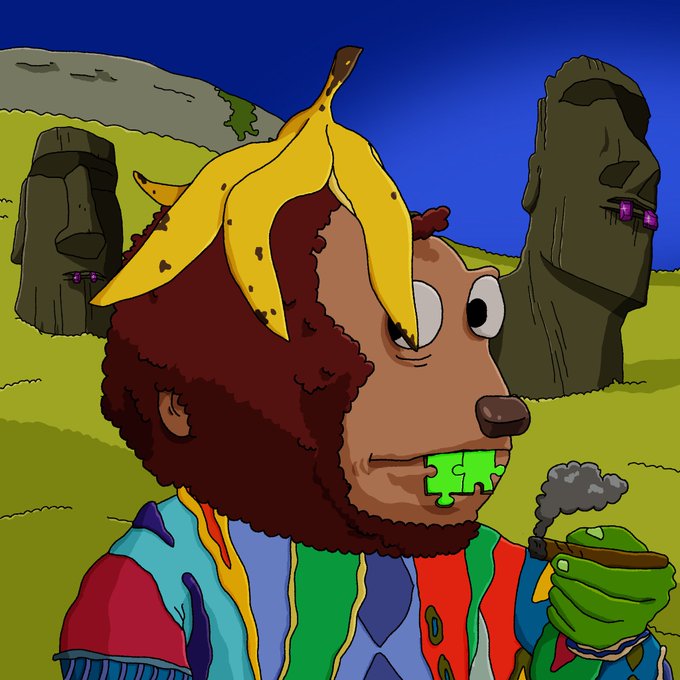 A cartoon bear character with a banana peel on its head, green slime dripping from its mouth, and wearing a colorful rainbow-striped sweater stands in front of two Moai statues.