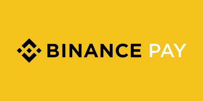 The image displays the Binance Pay logo on a bright yellow background, featuring the brand's distinctive diamond icon alongside the text "BINANCE PAY" in black and white. This visual aligns with the post's announcement of Binance Pay's new onchain payment solutions expanding its services to wallets, dApps, merchants, exchanges, and payment providers.