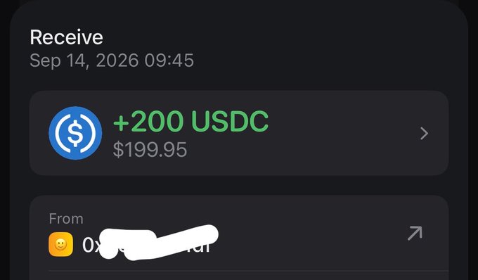 A screenshot of a cryptocurrency wallet notification showing a successful receive of "+200 USDC" (valued at $199.95) on September 14, 2026, from a redacted sender's address. The image visually confirms the post's caption about waking up with $0 and ending the day with $200.