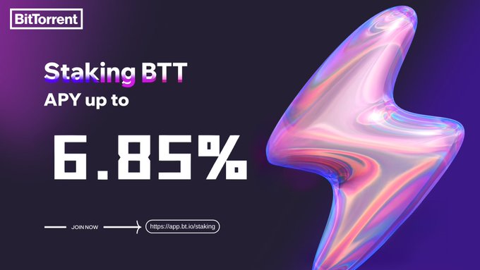 BitTorrent promo graphic advertising BTT staking with up to 6.85% APY, featuring the BitTorrent logo and a link to app.bt.io/staking alongside a pink iridescent 3D shape.