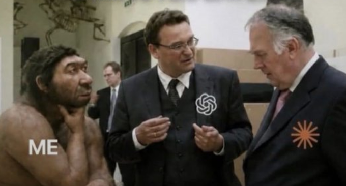 A humorous edited scene showing a caveman labeled 'ME' on the left, looking confused at a man in a suit with the OpenAI logo on his chest speaking to an older man wearing the same OpenAI logo.
