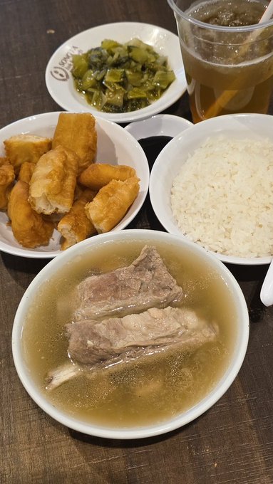 The image shows a table with four bowls of food, including rice, soup, meat, and fried food. The bowls are arranged around the table, creating an inviting scene for diners. A cup of tea can be seen near one of the bowls, adding to the cozy atmosphere. The post suggests that Bitcoin tests your patience but offers a sense of satisfaction when you find something good on it. This message is reflected in the image as well, with the four bowls of food representing different aspects of life or experiences, and the cup of tea symbolizing moments of relaxation and enjoyment amidst the challenges.