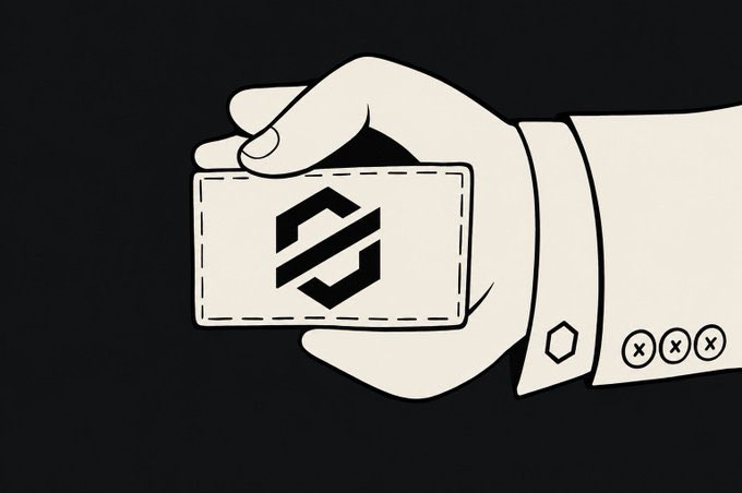 A simple line illustration depicts a hand in a suit sleeve holding up a card with the stylized 'S' logo associated with the Solana blockchain.