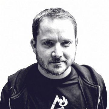 A black-and-white portrait of a bearded man in a hooded sweatshirt, identified in the accompanying post as Giacomo Zucco, director of Plan ₿ Network, pictured here alongside commentary about the BIP-110 fork and its implications for Bitcoin's governance and technical debates.