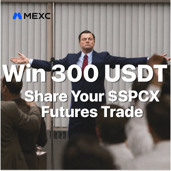 The image features a man standing up with his arms outstretched, possibly giving a speech or presentation. The background of the image shows a crowd of people listening attentively to him. There are also some text elements in the image that read "Win 300 USDT SPCX Share Your $SPCX Futures Trade". This suggests that there is an event related to trading futures and the man has won a prize, which could be a monetary reward or other benefits associated with his participation in the competition.
