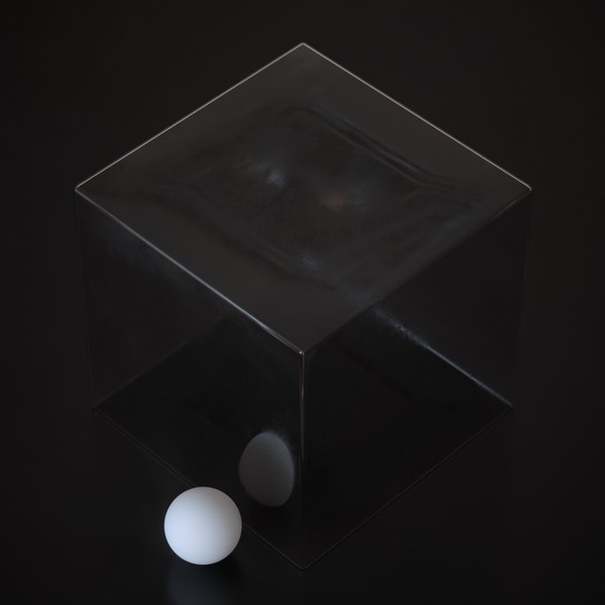 A dark, moody photograph of a transparent glass cube with a small white sphere resting beside it on a reflective black surface.