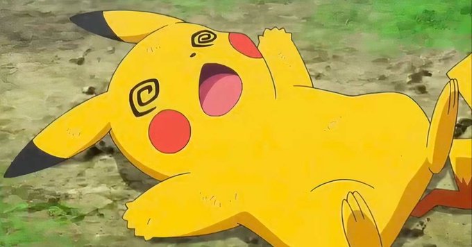 A dizzy Pikachu lies sprawled on the ground with swirls in its eyes and mouth agape, suggesting it has just been knocked out or confused. This cartoon image humorously illustrates the post's claim that the official Pokémon social media account was hacked to promote a memecoin scam, implying the beloved franchise has been left "knocked out" by the fraudulent incident.