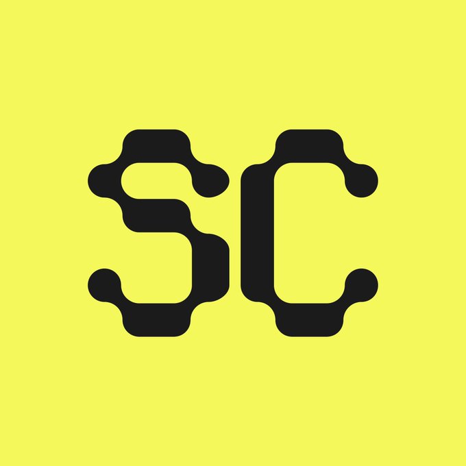 A bold yellow square features the black letters "SC" styled with circuit-board-like nodes at the corners, suggesting a tech or crypto branding context. The image appears to tie into the post's critique of how tokens are designed and distributed, using the stylized circuitry aesthetic to underscore the "broken design" theme in crypto tokenomics.