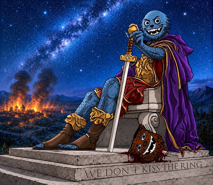 A blue, seal-like figure in royal attire sits on a stone pedestal holding a sword, with a severed head at his feet and the text "WE DON'T KISS THE RING" carved into the base, overlooking a burning city under a starry night sky.