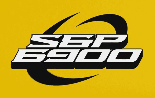 The image displays a logo with bold white text reading "SPX 6900" set against a black circular emblem on a bright yellow background. The logo relates to the post, where the user mentions holding SPX6900 as an original memecoin community from a previous cycle.