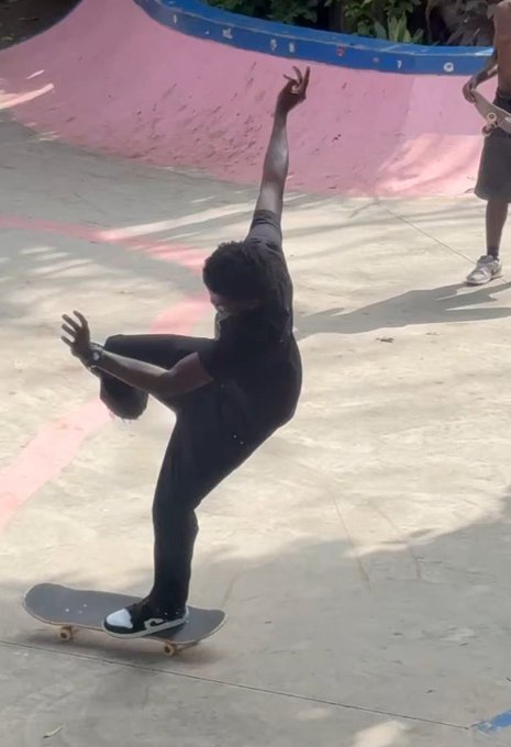 A skateboarder in dark clothing performs a trick on a pink skate bowl, arms raised dramatically, with another skater visible in the background.

The image complements the post's theme of a wishful "goodnight" to X, mirroring the hopeful sentiment of things "falling together in our favor" through the skater's balancing act and raised arms—perhaps a visual nod to the $RIVER token mentioned at the end.