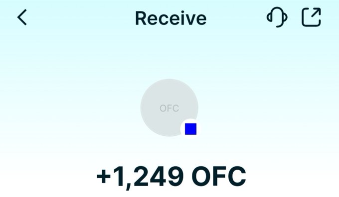 A mobile app screen showing a successful crypto transaction with a light blue gradient background, displaying '+1,249 OFC' tokens received.