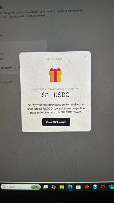 A computer screen displays a USDC Drop popup offering a $1 USDC variable transaction reward and a separate $5 USDC reward for verifying a MoonPay account.