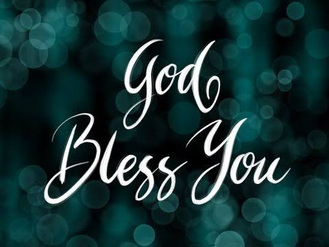 A graphic with a dark teal, bokeh-filled background displays the phrase 'God Bless You' in elegant white cursive script.