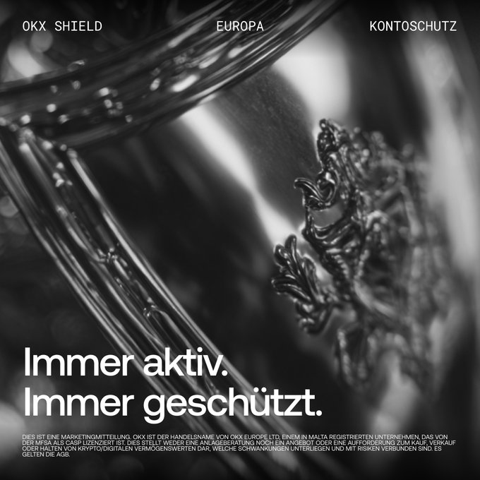 A black and white advertisement featuring a lion emblem with German text reading 'OKX SHIELD', 'EUROPA', 'KONTOSCHUTZ', and 'Immer aktiv. Immer geschützt.'
