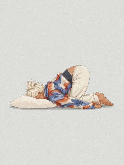 An anime-style illustration of a blonde person with a bun tied with a ribbon, wearing a tie-dye shirt and white pants, curled up and kneeling with their head down on a white pillow against a gray background.
