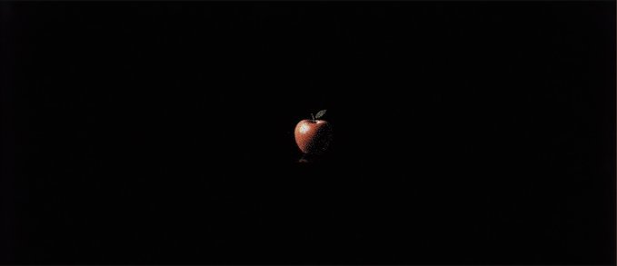 A small, pixelated red apple with a green leaf centered on a stark black background.
