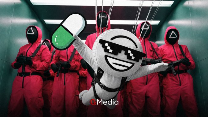 The image features a group of people dressed up as characters from a video game or movie, with one person wearing a white shirt that has a pill attached to their back. The group appears to be posing for a photo together, possibly at an event related to the game or movie they are portraying.