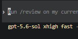 A close-up of a terminal/command line interface showing the text 'Run /review on my curren' and 'gpt-5.6-sol xhigh fast -' on a dark background.