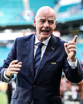 Gianni Infantino, FIFA President, is shown passionately gesturing on a football pitch. The image relates to the post by visually identifying the subject whose odds of no longer leading FIFA by the end of the year are reportedly rising to 39%.