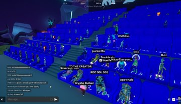 The image shows a screenshot from the Otherside Metaverse gaming platform, featuring numerous blue avatar players gathered in a virtual amphitheater-like setting, with usernames like "CHEMIus," "punketta," "NOC SOL 300," and "CryptoBullzz" visible above the characters. The "Year One: Persistent Otherside" caption references the platform's first anniversary celebration, showcasing the active multiplayer community within this Yuga Labs metaverse environment.