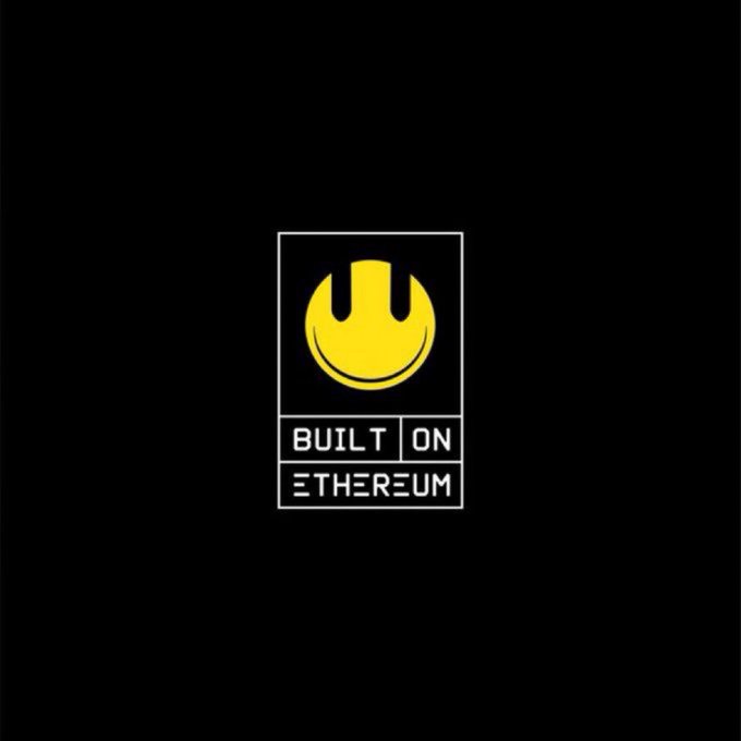 A logo on a black background featuring a yellow smiley face inside a rectangular frame, with the text 'BUILT ON ETHEREUM' displayed below.