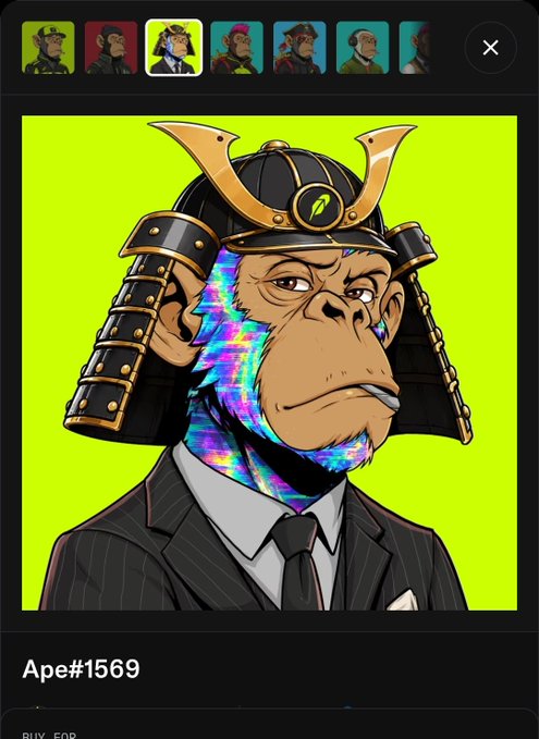 A digital NFT artwork titled "Ape#1569" displays a suited chimpanzee wearing an ornate samurai helmet with rainbow-colored fur, set against a neon green background. The image relates to the post by showcasing a "suited ape" NFT character, fitting the user's reference to @TheSuitedApes in a playful inquiry about the "apes joint."