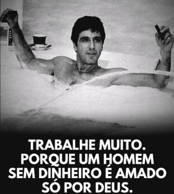 A black-and-white photo of a man relaxing in a bubble bath, holding a cigar and a phone, with Portuguese text below reading 'TRABALHE MUITO. PORQUE UM HOMEM SEM DINHEIRO É AMADO SÓ POR DEUS.'