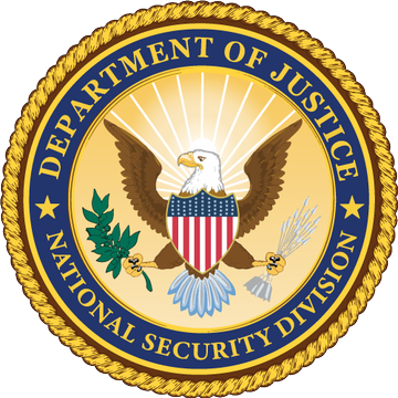 The official circular seal of the U.S. Department of Justice National Security Division, featuring an eagle with a shield, olive branch, and arrows on a gold background with blue borders.