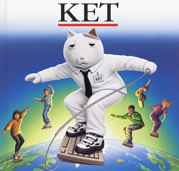An illustration titled 'KET' showing a large white cat in a shirt and tie with a 'KET' name tag, jumping rope on a computer keyboard atop a globe, while children dance on keyboard keys around it.