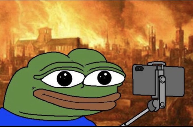The image features a cartoon frog with big eyes, giving it a friendly appearance as if it's taking a selfie or capturing a picture of itself using a cell phone. The background shows an urban setting with buildings and fire, which adds a sense of realism to the scene. The caption "havent seen CT this complacent since 10/17" suggests that the frog might be sharing its photo on social media platforms as a way to express its feelings about the current state of the world or to raise awareness about an issue.