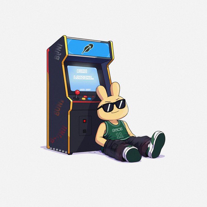 Cartoon illustration of a yellow bunny mascot wearing sunglasses and a green jersey, sitting on the ground leaning against a 'BUNI Loading' arcade cabinet.