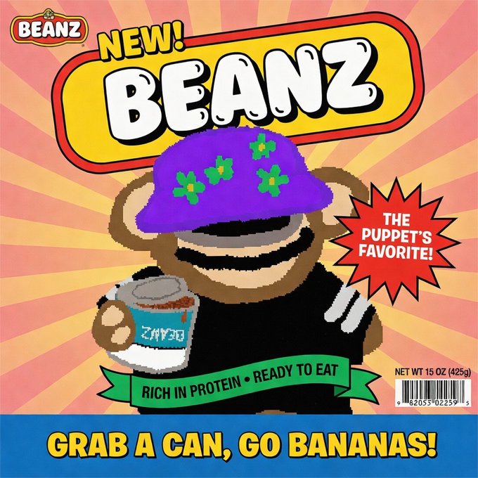 A colorful advertisement for "BEANZ" features a cartoon puppet wearing a purple floral hat and holding a can, with text reading "THE PUPPET'S FAVORITE!", "RICH IN PROTEIN • READY TO EAT", and "GRAB A CAN, GO BANANAS!".