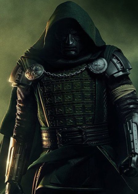 A hooded, armored figure with intricate battle gear and glowing accents stands in a dark, greenish haze. The post references "Doomsday $2.5B" and "Secret Wars $3B," likely alluding to the Marvel villain Doctor Doom, whose imposing visual matches the ominous tone of the box office projections.