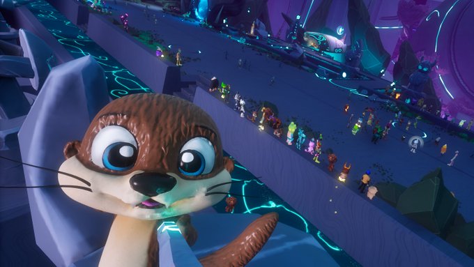 A 3D animated otter character with large blue eyes appears in the foreground of a vibrant, neon-lit video game environment populated by many small player characters.