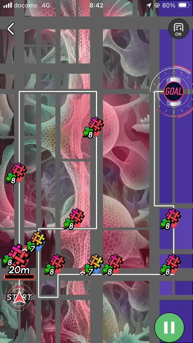 A mobile game screenshot shows a puzzle-like map with colorful pixelated characters overlaid on a cellular tissue background, featuring 'GOAL' and 'START' markers and a pause button.