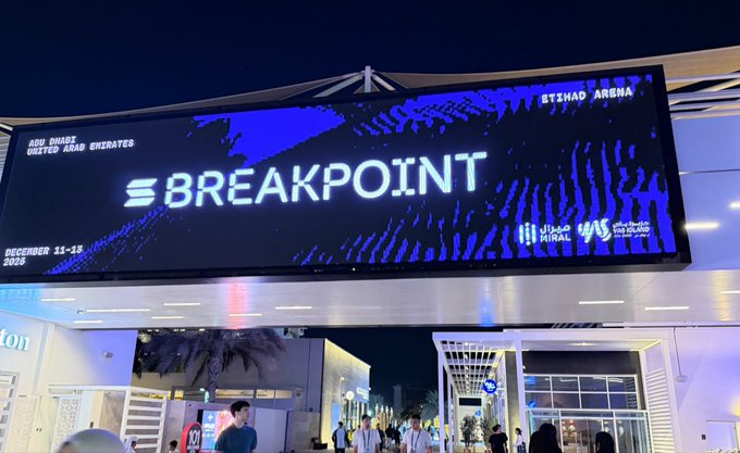 A brightly lit digital billboard displays 'BREAKPOINT' at Etihad Arena in Abu Dhabi, United Arab Emirates, scheduled for December 11-13, 2026, with logos for Abu Dhabi, Miral, and World Tennis League visible.
