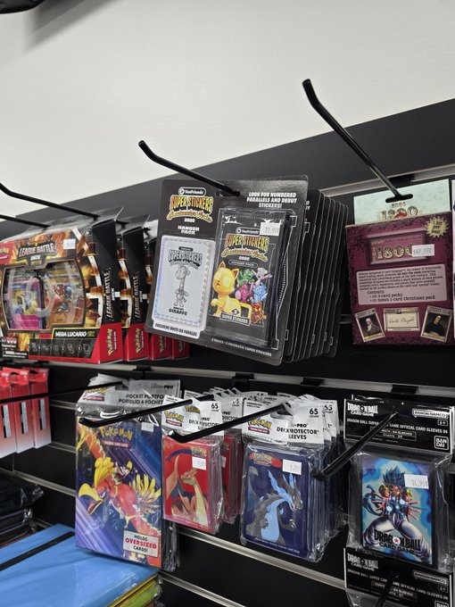 The image shows a display of various Pokemon cards, including packs with stickers for different characters. The cards are organized by type and color, making them easily accessible for collectors or casual gamers alike. The post about the @veefriends Super Stickers seems to be related to these Pokemon cards, as it suggests that the cards might have been purchased from a local card shop where this particular product is available.