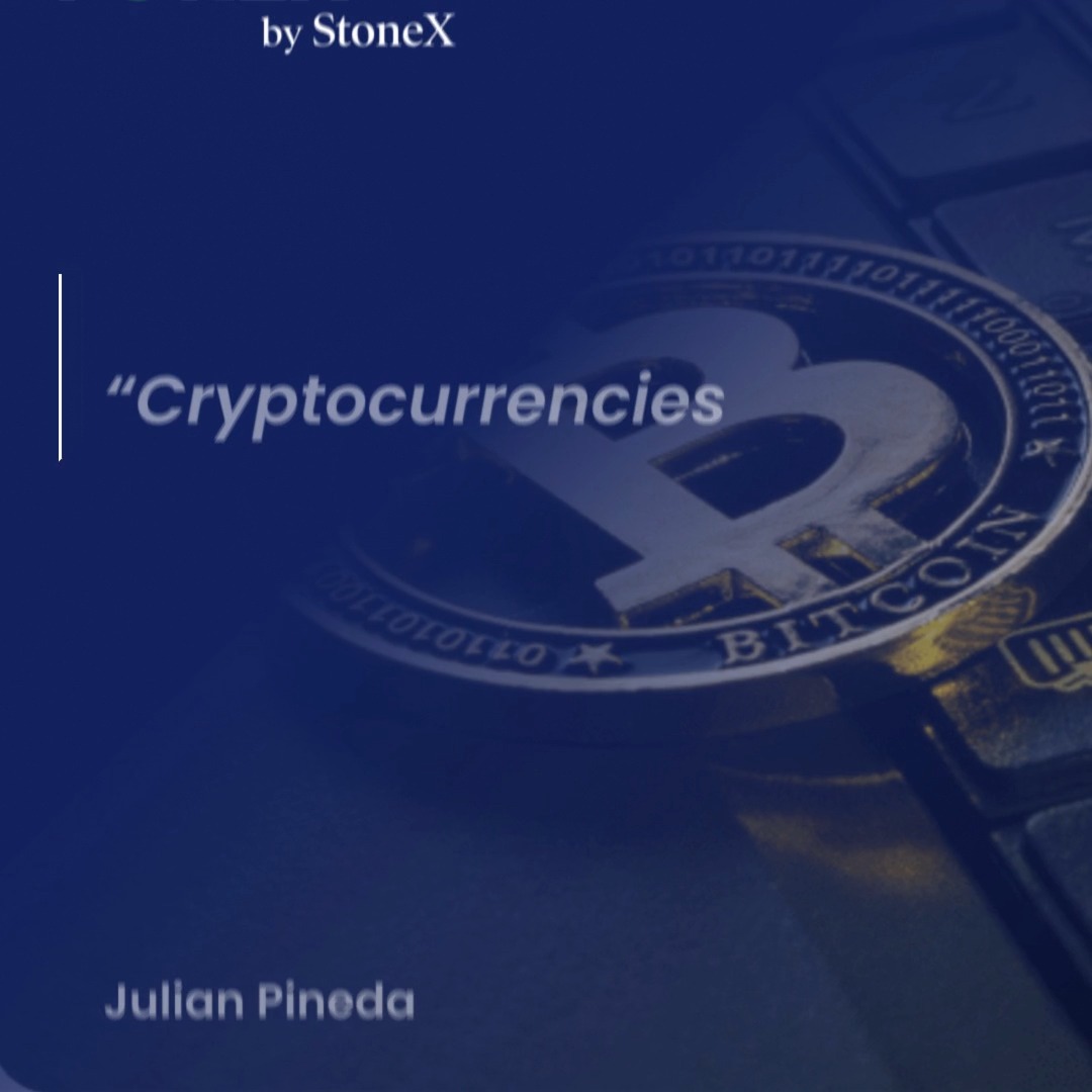 A dark blue-themed graphic by StoneX features a close-up image of a physical Bitcoin coin alongside partial views of a keyboard, with the partial title "Cryptocurrencies" displayed prominently and "Julian Pineda" credited at the bottom, serving as a cover for an article discussing the current direction of crypto markets and key levels to watch.