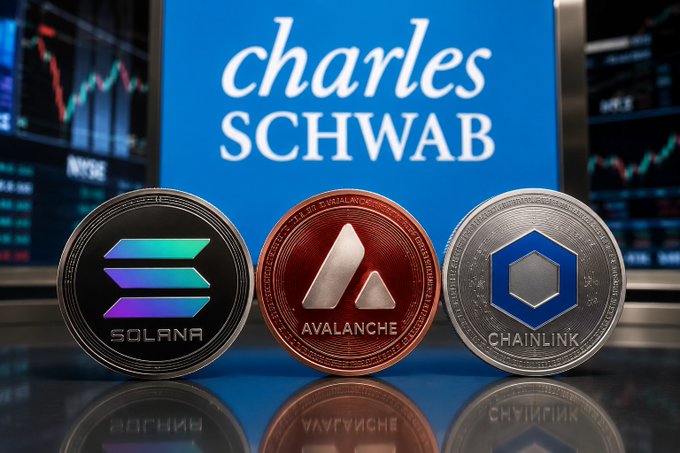 Three cryptocurrency coins (Solana, Avalanche, and Chainlink) displayed in front of a Charles Schwab sign and stock market charts.