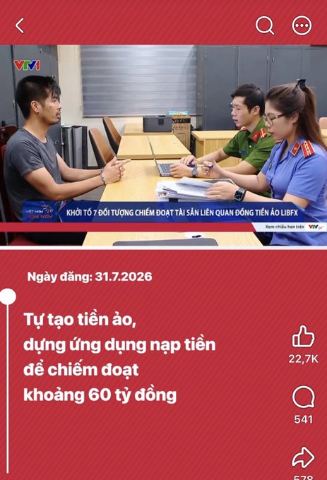 A Vietnamese news article dated 31.7.2026 with the headline 'Tự tạo tiền ảo, dựng ứng dụng nạp tiền để chiếm đoạt khoảng 60 tỷ đồng', featuring a thumbnail of a VTV news broadcast showing a man being questioned by officers.