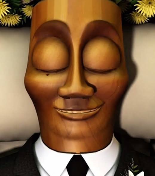 A wooden mannequin mask with closed eyes and a slight smile is dressed in a formal black suit and tie, fitting the playful "GM to those who tung tung tung!" greeting that references the viral Tung Tung Tung Sahur meme character.