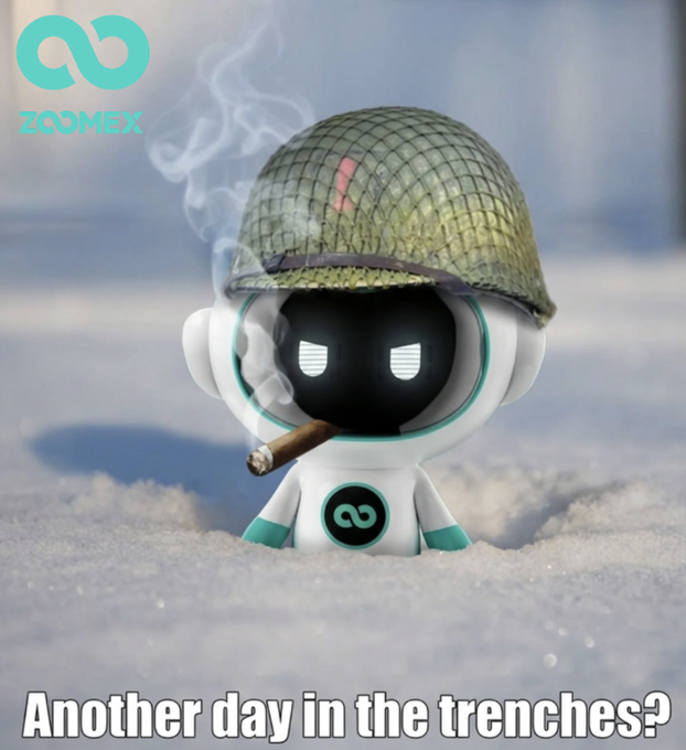 The image features a small, white robot with a green helmet sitting in the snow. The robot has a cigarette in its mouth and appears to be smoking while surrounded by the snowy environment. Below the robot's head, there is text that reads "Another day in the trenches?". This phrase seems to be related to the post about buying dip at 83k or 70k, as it suggests that the person who posted this image might have been discussing a similar situation with someone else.