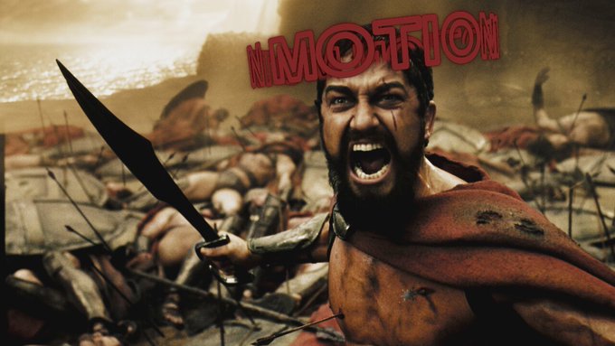 A dramatic parody image styled like the movie '300', showing a warrior screaming in battle with the word "NMOTION" in red stylized text overlaying the scene.