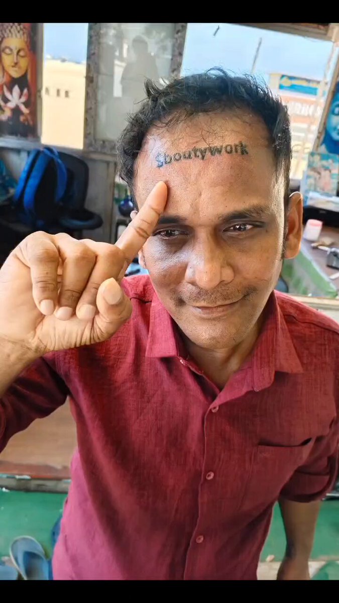 The image features a man with a tattoo of "$BOUTYWORK" written on his forehead, who is posing for a photo. The caption below the image reads, "He got $BOUTYWORK tattooed on his forehead to win 40 $SOL... and the story turned into a fiasco... On Pumpfun, a bounty of 40 $SOL was offered to anyone who would agree to get ..."