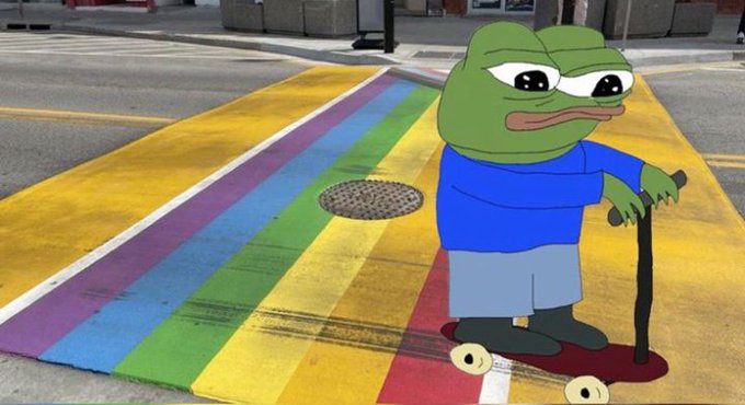 A meme image combining Pepe the Frog cartoon character with a rainbow crosswalk and skateboarding imagery in an urban street setting.