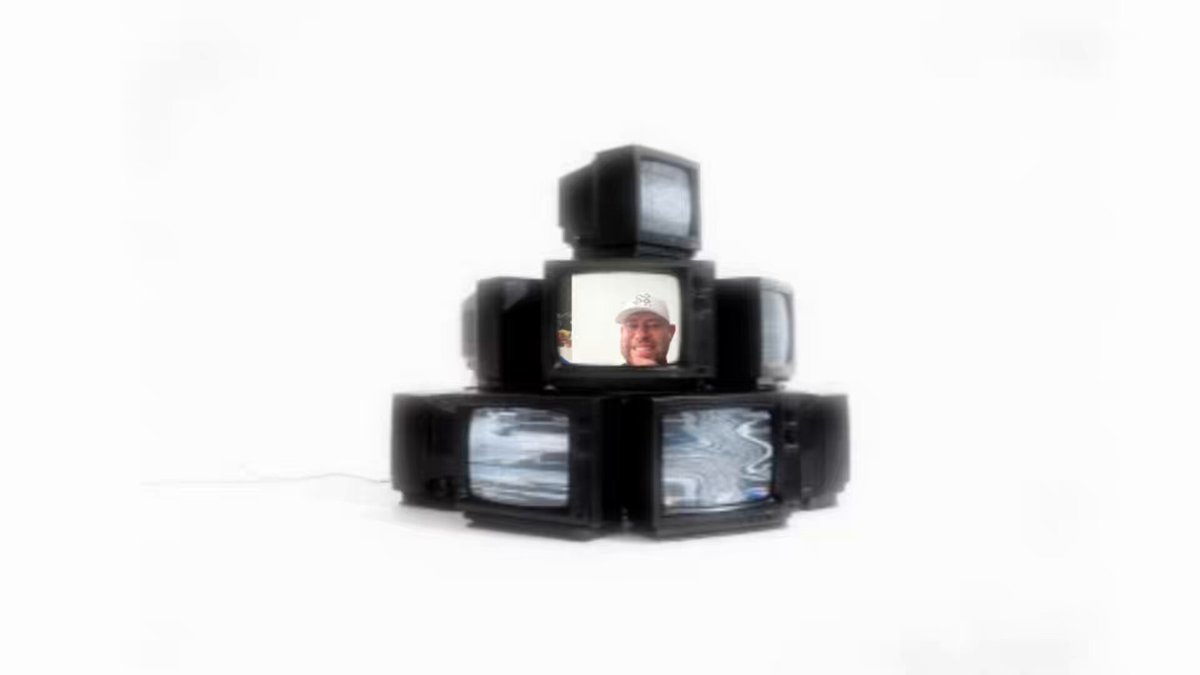 The image features a stack of seven black televisions arranged in a pyramid shape against a white background. The televisions are positioned at different angles, creating an interesting visual effect. The caption below the image reads "KiiChain co-founder Danyel reveals the problem both web2 and web3 are trying to fix". This statement is related to the image as it highlights the connection between the stack of televisions and the ongoing discussion about the differences between web2 and web3 finance.
