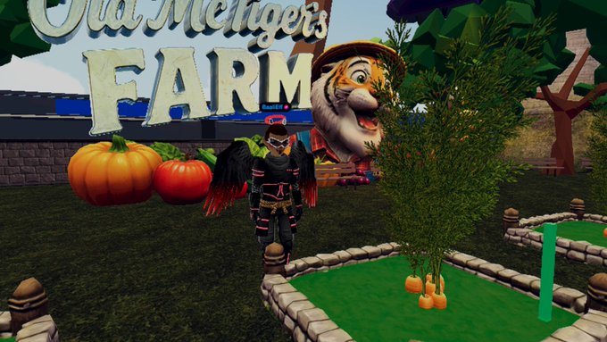 A 3D video game scene at 'Old McGee's Farm' featuring a character with dark wings standing near pumpkins and a large tiger head.