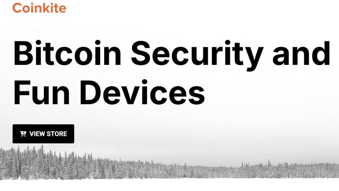 A Coinkite advertisement banner with the headline 'Bitcoin Security and Fun Devices' featuring a 'VIEW STORE' button, set against a snowy forest background.