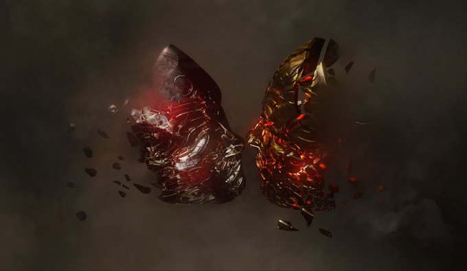 Two cracked, shattered mask-like halves float in dark smoke, one red and one gold, glowing with fiery light and breaking apart.